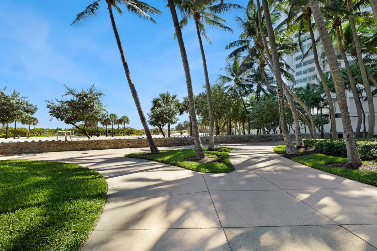 Palm-lined promenade, maintained by Everglades Environmental Care